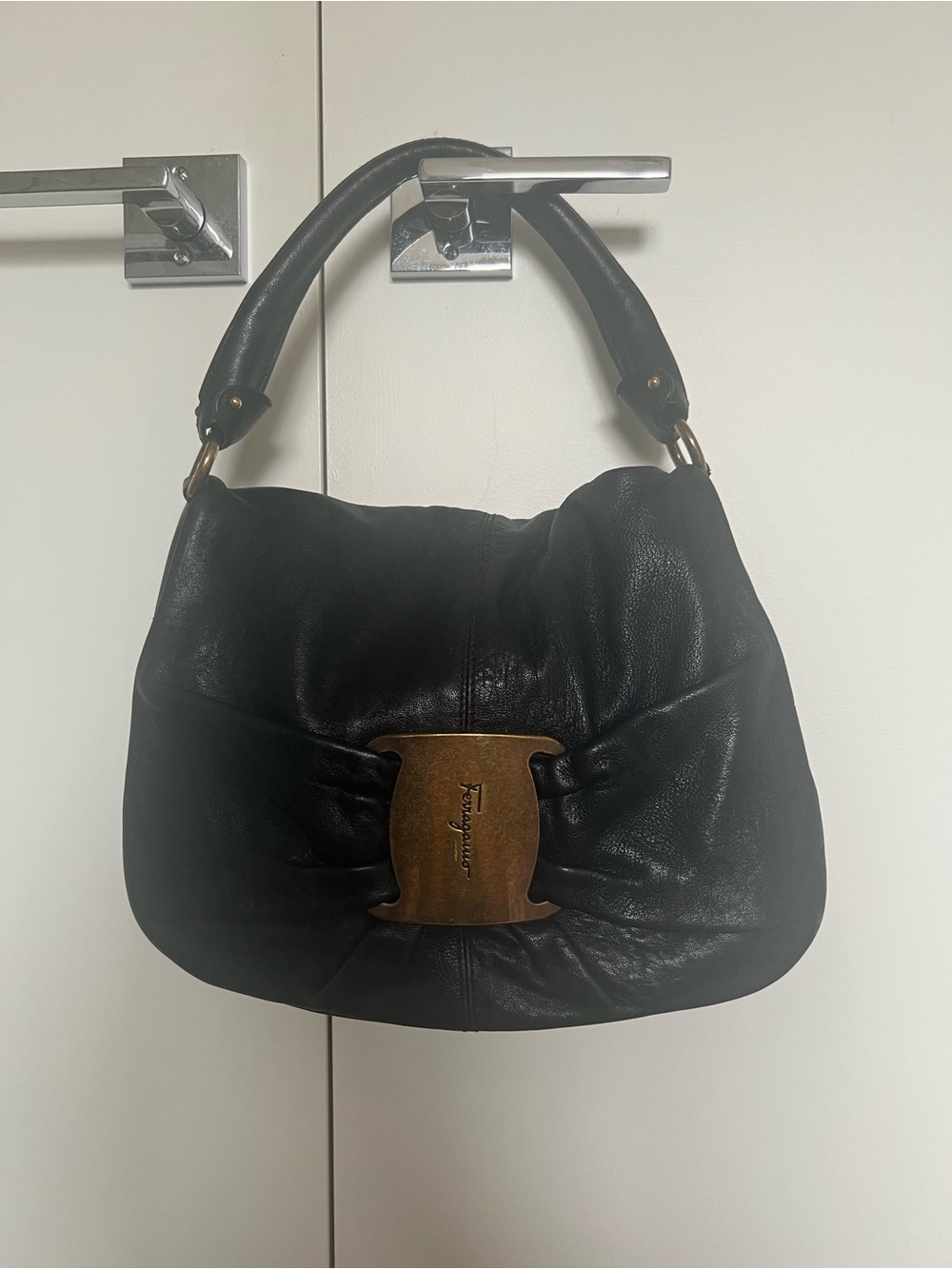Salvatore Ferragamo Black Leather Bag with Gold-Tone Plaque
